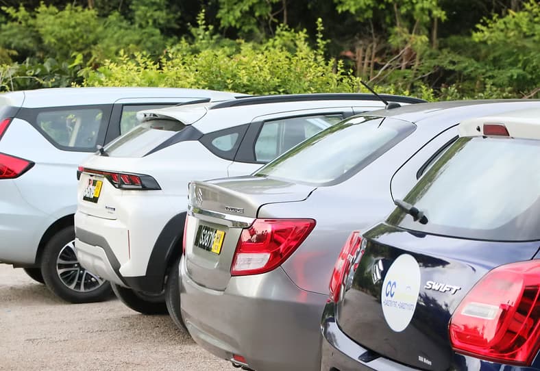 CC CarHire team and vehicles in Praslin